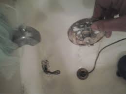 A plumber's snake is a very useful tool when it comes to dealing with clogged drains. How Do I Snake This Tub Drain Home Improvement Stack Exchange