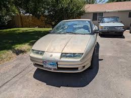 Image result for Bright Red 1995 Saturn