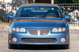 Image result for Dark Ming Blue 2004 Pontiac