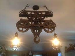 Antique Hay Trolley Hanging Island Cage Lighting Made From An Antique Beatty Bros Pacific Car Hay Trolley Vintage Lighting Cool Lighting Steampunk Lighting