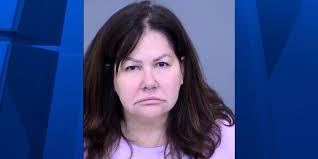 Woman arrested following deadly crash