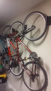Arms adjust independently in two dimensions to hold all types of bikes. Swivel Bike Hook Rack Bike Rack Wall Bike Storage Garage Bike Rack Garage