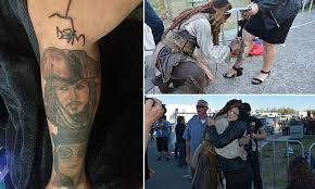 Apr 24, 2019 · johnny depp showing off some of his tattoos. Mum Covered In Johnny Depp Tattoos Gets His Signature Inked On Her Leg Daily Mail Online