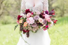 Whether you go for a pop of pink, a sunset orange or deep red the ranunculus has closely formed petals and make a striking display. Vintage Spring Wedding Inspiration Deco Weddings