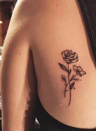 30 Delicate Flower Tattoo Ideas Rose Rib Tattoos Tattoos Delicate Flower Tattoo