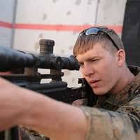 Staff Sgt. David Cain retrieves a Mark II Talon Explosive