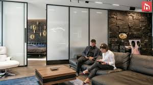 Modern industrial bachelor pad filled iconic cor. A Modern Bachelor Pad With Smart Glass Space Dividers Youtube