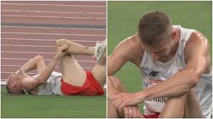Marcin lewandowski of poland celebrates winning bronze in the men's 1500 metres final during day ten of 17th iaaf world athletics championships doha. Kbgkmkhl2mp2pm