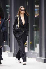 And if you ask me, one of the most effortlessly cool accessories money can buy these days is a baseball cap.everyone looks good in them, they protect your face from the sun, and they add personality to your look. Emily Ratajkowski In Black Blazer With Matching Slacks In Nyc Sneakers Street Style Fashion Inspo Outfits Fashion