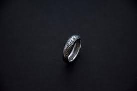 The classic engagement ring is crafted in 14k white gold and has a brilliant 0.23ct round diamond in the center, with a round diamond halo so serene, it will make your day, everyday! Dark Wood Grain Ring Sterling Silver Etsy