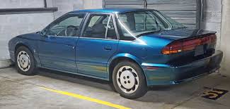 Image result for Dark Blue Green 1993 Saturn