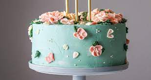 I think i'm just going to insert this right on the side so it looks like it's peeking out from between the two tiers. Layered Vanilla Cake With Vanilla Buttercream Wife Mama Foodie