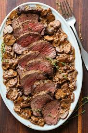 Searing the beef tenderloin roast in a skillet gives a lovely browned appearance to the meat and seals in the flavorful juices. Beef Tenderloin With Mushroom Sauce Video Natashaskitchen Com