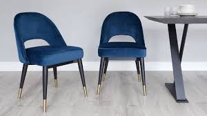 Toronto crushed silver velvet knockerback dining chair. A Mid Century Modern Inspired Velvet Dining Chair With A Brass Leg Detail Clover Champagne Velvet Velvet Dining Chairs Blue Velvet Dining Chairs Dining Chairs