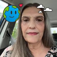 Who is Dhani Harrison's famous father?