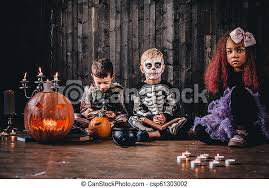 What are the halloween costumes? Group Of Cute Multiracial Kids In Scary Costumes During Halloween Party In An Old House Halloween Concept Canstock