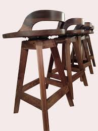 sculpted bar stools / walnut bar stools