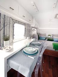 Borrowed Efficiency Idea From A Stylish Rv Pull Out Dining Table Explorerrv Com Cargo Trailer Camper Conversion Cargo Trailer Camper Remodeled Campers