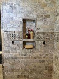 It is formed inside hot springs where the these holes give travertine tiles their naturally rustic appearance. Design By Kirsty Silver Travertine Travertine Shower Bathroom Remodel Shower