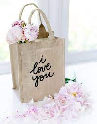 Wrap Up A Thoughtful Gift In This Lovely Bag This Reusable Handmade Bag Is Water Resistant And A Gift That Keep Designer Christmas Gifts Gifts Small Gift Bags