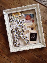 If you're low on time like any mom of a baby and toddler, there's no easier way to start creating memories than with a simple handprint activity you can convert into a special keepsake. Pin By Ffion Wells On Handmade Baby Shadow Box Newborn Shadow Box Baby Memory Frame