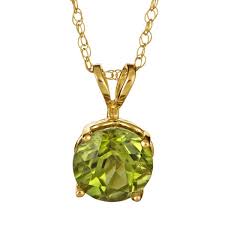 When set in gold, this gem was said to protect the wearer from nightmares. 14k Gold Peridot Pendant