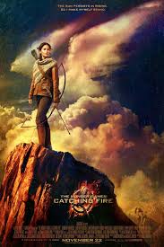 The First Hunger Games Catching Fire Movie Poster Has Arrived And Jennifer Lawrence Looks Awesome New Hunger Games Hunger Games Catching Fire Hunger Games