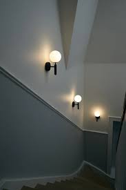 The elska wall mount sconce or reading light shown in unlacquered brass and perfect white enamel fabricated in nyc by blueprint… our versatile, articulating wall light dons a woven wicker shade for a fun, textural mix. Miira Wall Sconce In 2021 Hallway Wall Lights Black Wall Lights Wall Lights