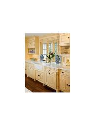 While the base color may be a shade of white or cream, the rest of the kitchen focuses on warm shades of blue, red, yellow or green. Painting Kitchen Cabinets French Country Yellow