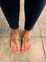 We found some amazing dupes of the popular Tory Burch Miller sandals.  Andrea (left photo) is wearing the Report Genie flip flop in gold and  Rachael (right photo) is rocking the Sam