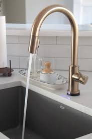 Browse 11,652 gold faucets kitchen on houzz you have searched for gold faucets kitchen ideas and this page displays the best picture matches we have for gold faucets kitchen ideas in may 2021. The Kitchen Bling Gold Faucet Gold Kitchen Faucet Gold Faucet Bronze Kitchen Faucet