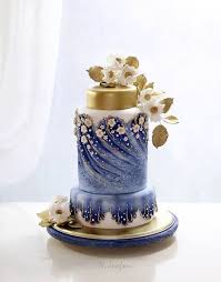 There are 2 painted gold separators and it. Blue And Gold Cake Amazing Cake Ideas