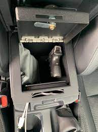 My wife's 2010 toyota tacoma center console latch broke (the little pieces that hold it in snapped off), so i took the part, some calipers, and sat down at my computer to cad up a new one! Tacoma 3rd Gen Oem Center Safe Locker Down Console Vault Tacoma World