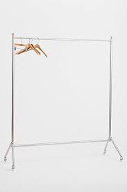 Extra hanging space adjustable height: Rolling Silver Clothing Rack