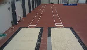 A soft and sandy landing pit awaits the long jumpers and triple jumpers at the olympic stadium at the tokyo games. Long Jump Triple Jump Pit Sand Waupaca Sand Solutions