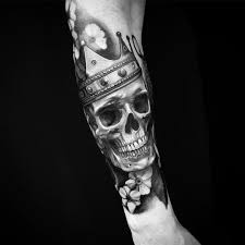 This includes a skull and a serpent, often slithering in the skull. Skull Crown Tattoo Tattoo Ideas And Inspiration Skull Sleeve Tattoos Tattoos Skull Tattoos