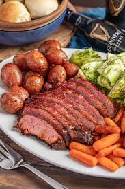 Remove the beef (keep warm) and any solids from the cooking liquid and add potatoes, carrots, and cabbage wedges. Easy Corned Beef And Cabbage Stovetop Or Slow Cooker