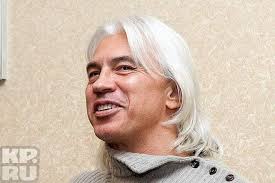 Dmitri Shostakovich addresses reporters and faculty at a Northwestern  University press conference. On left, Alexander Dunkel, U.S. State  Department liaison and interpreter. 15 June 1973. Photographed by L. Lopez.  Courtesy of Bryan