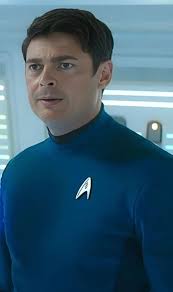 Was Dr. McCoy's emotional nature a strength or a liability in tense  situations?