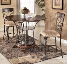 Natural slate tiles, inset into the frame, create a surface that is organic and pleasing. Alyssa 3 Piece Counter Height Dining Table Set By Ashley Furniture Ashley Furniture Dining Furniture Dining Table Slate Coffee Table