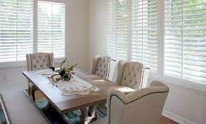 This type of blind is perfect for pairing with a pair of dress curtains, especially on larger windows where long, bulky curtains can be a chore to open and close; Custom Plantation Shutters Shades Blinds Austin Window Fashions
