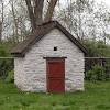 Here is a pump house/garden shed to protect the well plumbing and to house a manifold for an irrigation system and backup water supply. 1