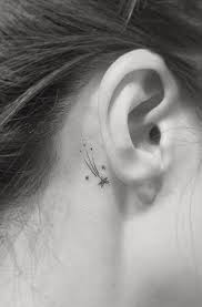Meaning And Tattoo Designs Of The Stars Designs Meaning Stars Tattoo In 2020 Star Tattoos Behind Ear Tattoo Shooting Star Tattoo