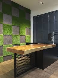 The New Officeworks Johor Jaya Feature Wall Made Up Of Wood Vinyl Hexagon Shaped Tiles And Grass Carpet Na Grass Decor Grass Carpet Artificial Grass Wall