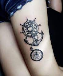 While the minimalist black ink compass represents direction, the simple anchor shows. 37 Captivating Anchor Tattoos Straight From The Sea Tattooblend Trendy Tattoos Thigh Tattoo Tattoo Designs Wrist