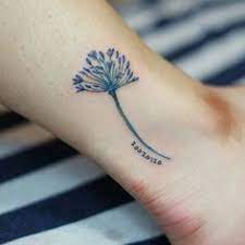 Gripping Agapanthus Tattoo 2019 Tattoos Cool Tattoos Small Tattoos