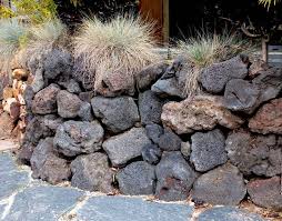 Broadmoor Wall Rock Boulders Rock Retaining Wall Patio And Garden Garden Design Layout