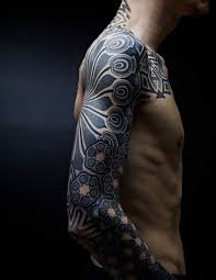 The reason these are so popular is due to the people that are carrying such tattoos are not only normal but celebrities and wwe superstars have tribal tattoos in bulk. 125 Tribal Tattoos For Men With Meanings Tips Wild Tattoo Art