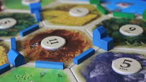 They can also get development cards, and in development cards are a resource in catan that can be paid for during a player's turn. Catan Review Here S Why You Should Own This Board Game Reviewed Lifestyle