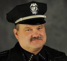 Ex-chief disputes cop's timeline to $2.7M inheritance